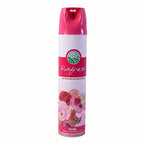 Rose fragrance air freshener spray in hands