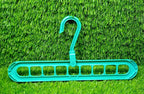 Single multi-functional clothes hanger demonstrating its vertical hanging option.