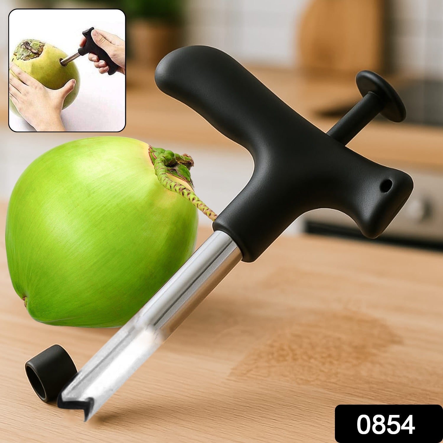 Close-up of the sharp tip of a stainless steel coconut opener tool.
