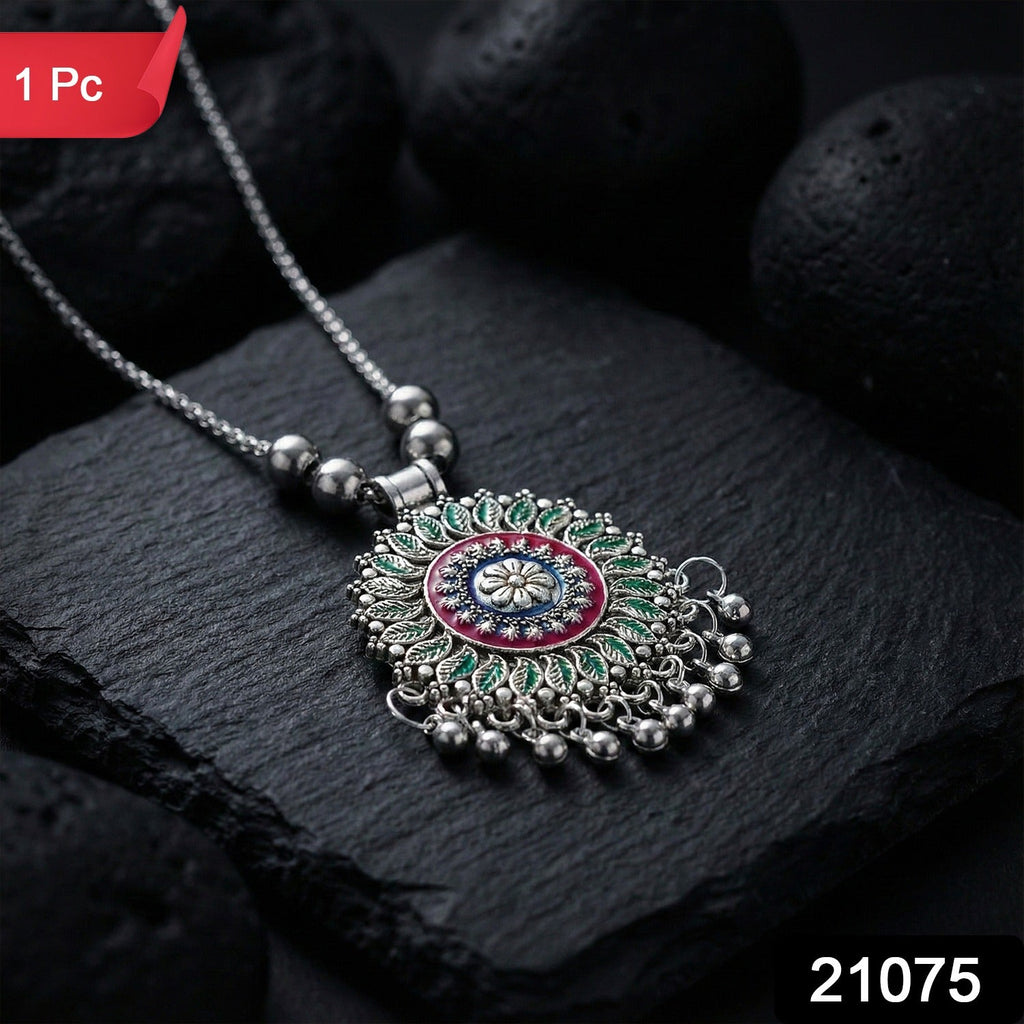 Traditional style charm necklace featuring oxidized floral mandala design with hanging beads