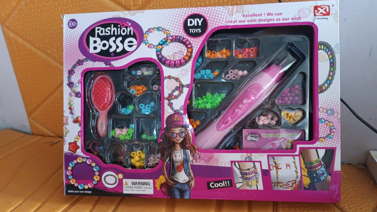 Two girls enjoying a fun hair styling session with the easy-to-use beader kit.