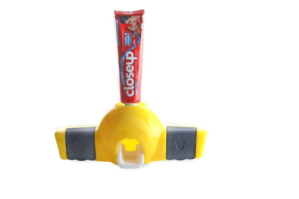 Internal view of the automatic toothpaste dispenser highlighting its vacuum pump system.