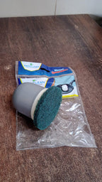 Kitchen scrubber removing burnt grease and food stains effectively