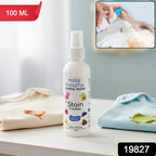 Spray cleaning solution removing stains from clothes using Instant Stain Remover
