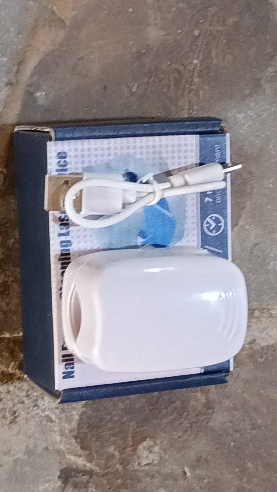 Retail packaging for the AuriGlam Rechargeable Nail Fungus Laser Treatment Device.