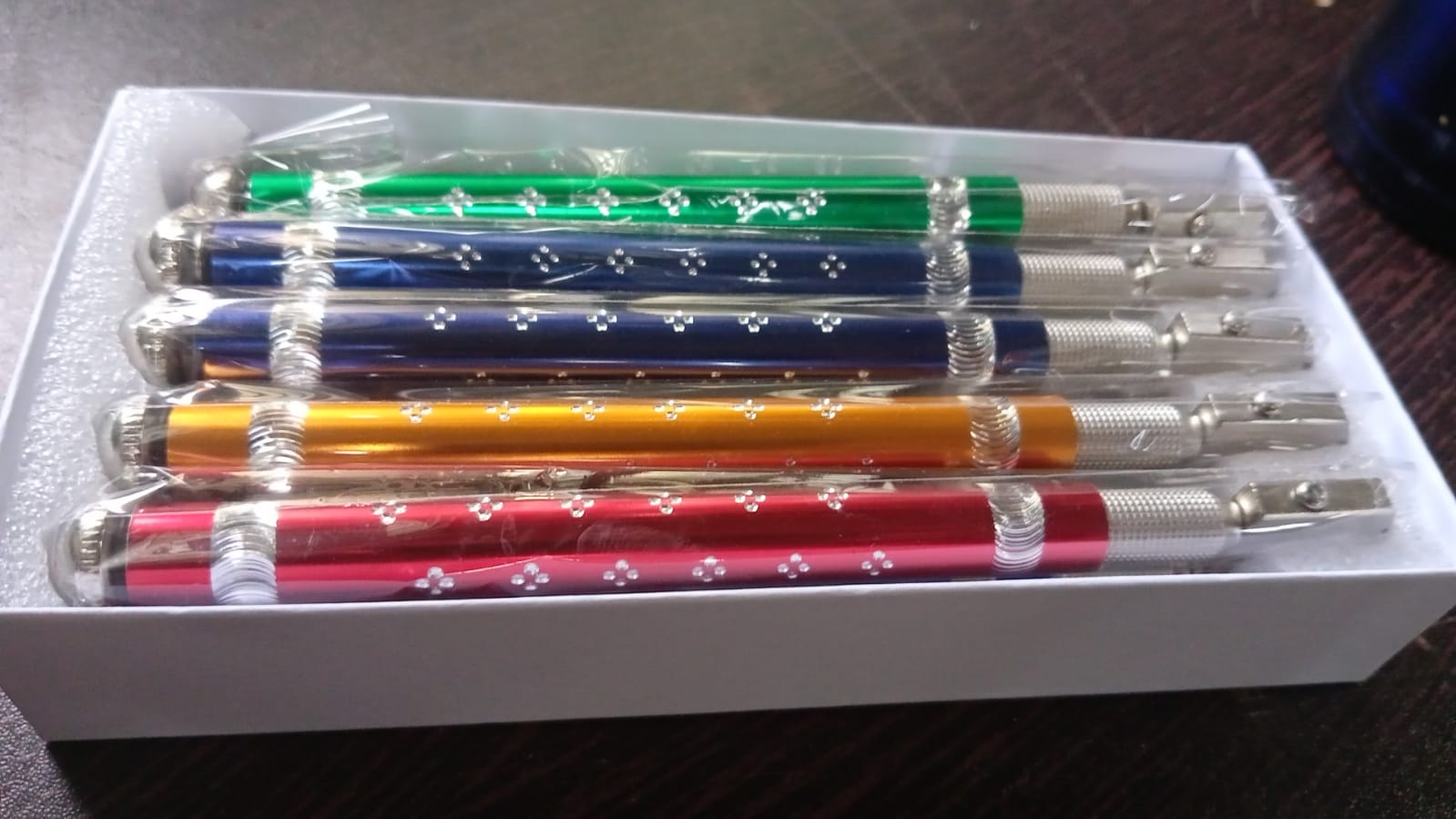 Pencil style glass cutter with its included oil dropper.