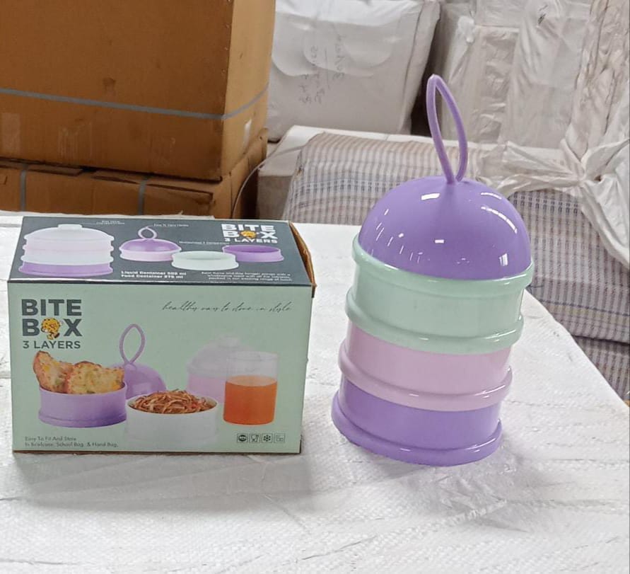 Vibrant purple baby food container with 3 layers, showcasing its practical design.