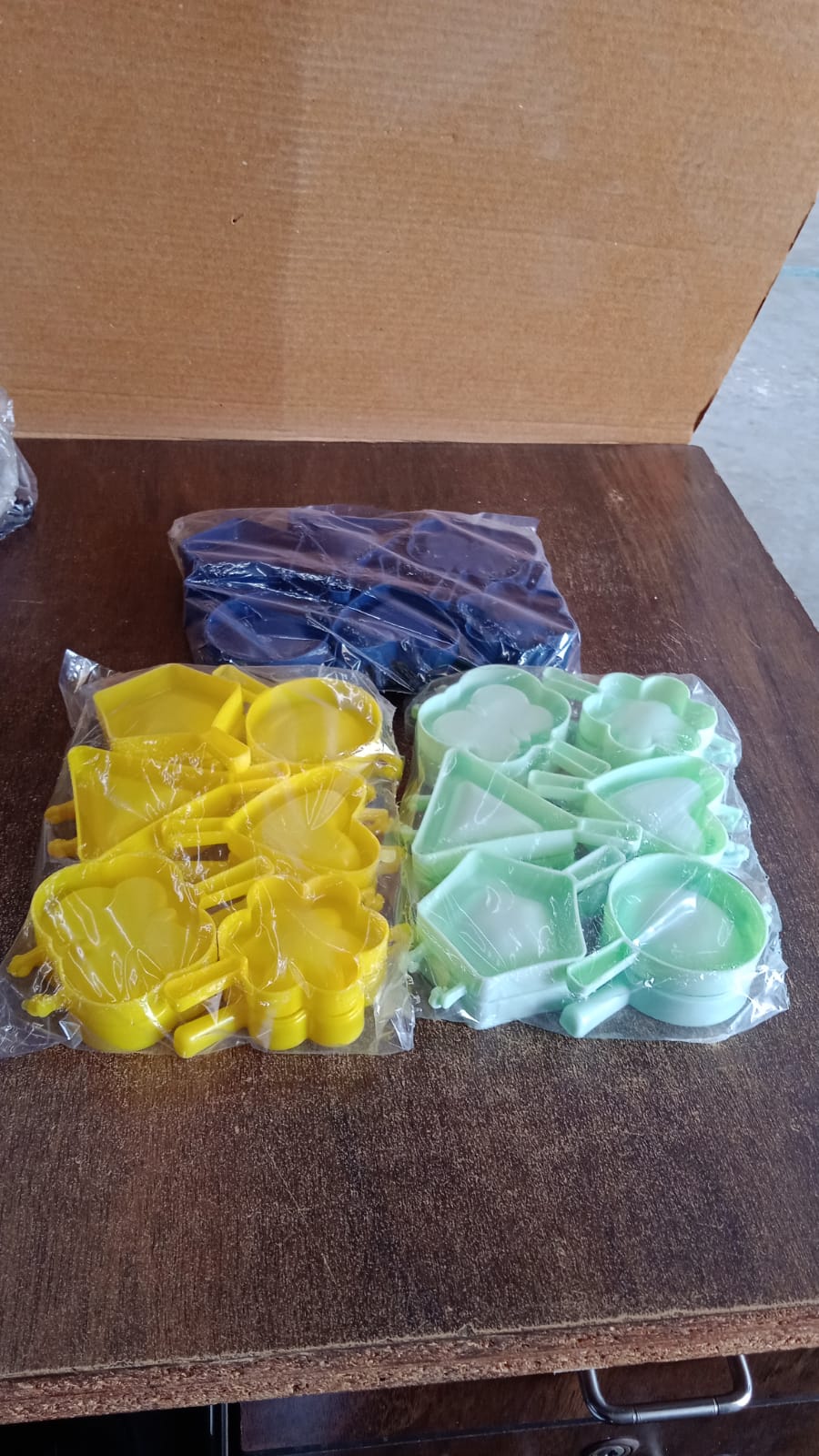 Plastic cookie cutter moulds set displayed for creative baking projects