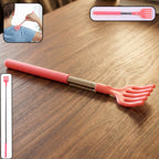 Telescopic back scratcher with soft silicone claw, fully extended for reach.