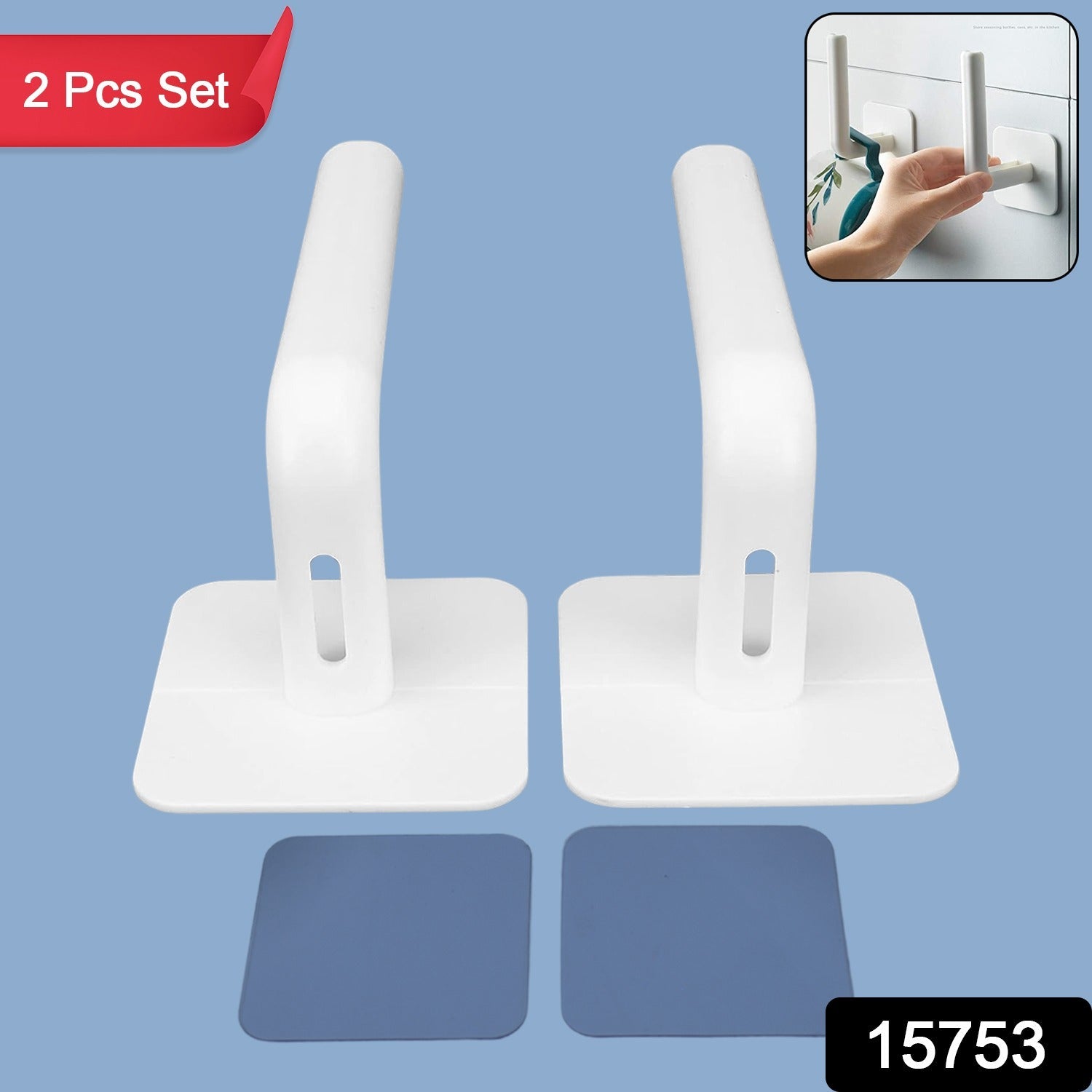 Close-up of the white hanging storage rack showing its drain holes and capacity for small items like sponges or toiletries.