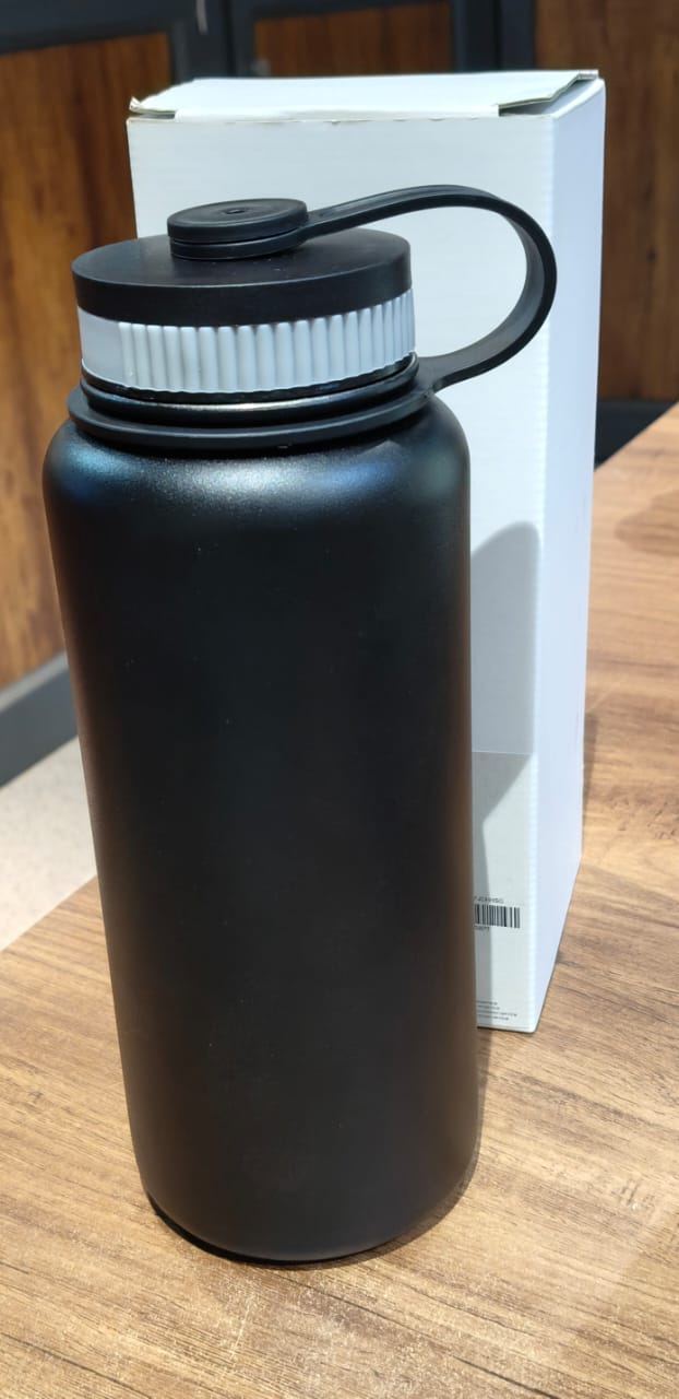 Compact black vacuum insulated stainless steel water bottle