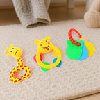 Three-piece baby rattle set featuring colorful animal shapes for sensory play