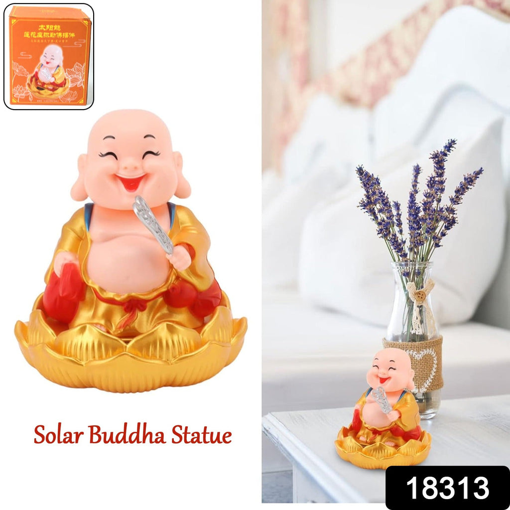 Close-up of the solar-powered nodding Buddha statue, showcasing its intricate details.