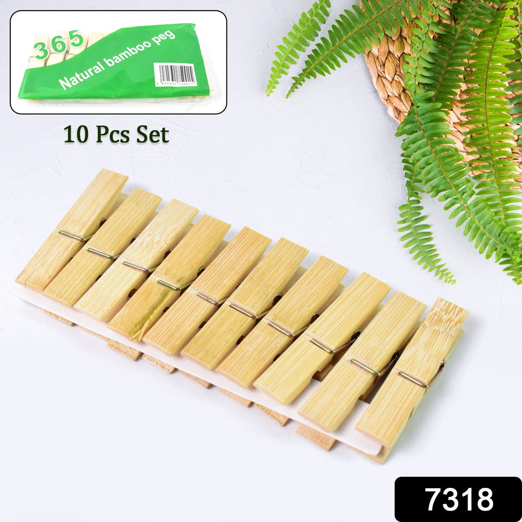 Close-up of natural wooden clothes pegs showing strong grip mechanism.