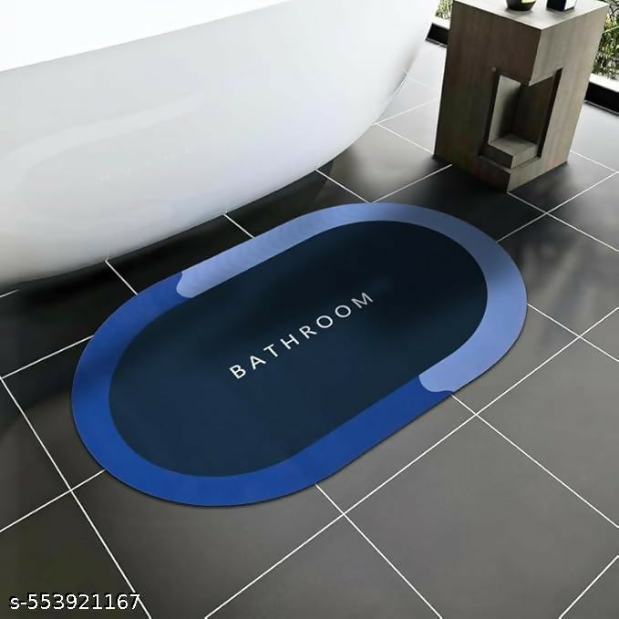 Corner view of non-slip bath mat resting firmly on tiled floor