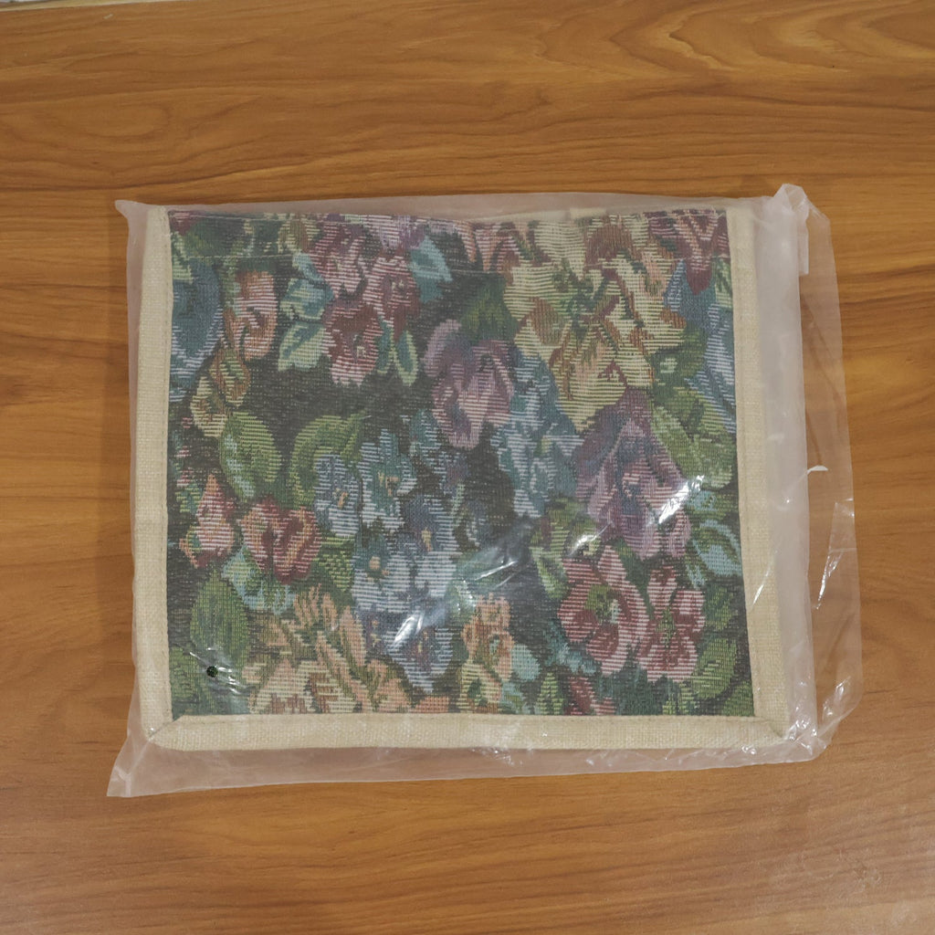 In-use floral carry hand bag for shopping or travel