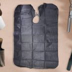 Folded portable waterproof hair cutting cape