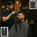 Professional waterproof hair cutting cape in sleek black