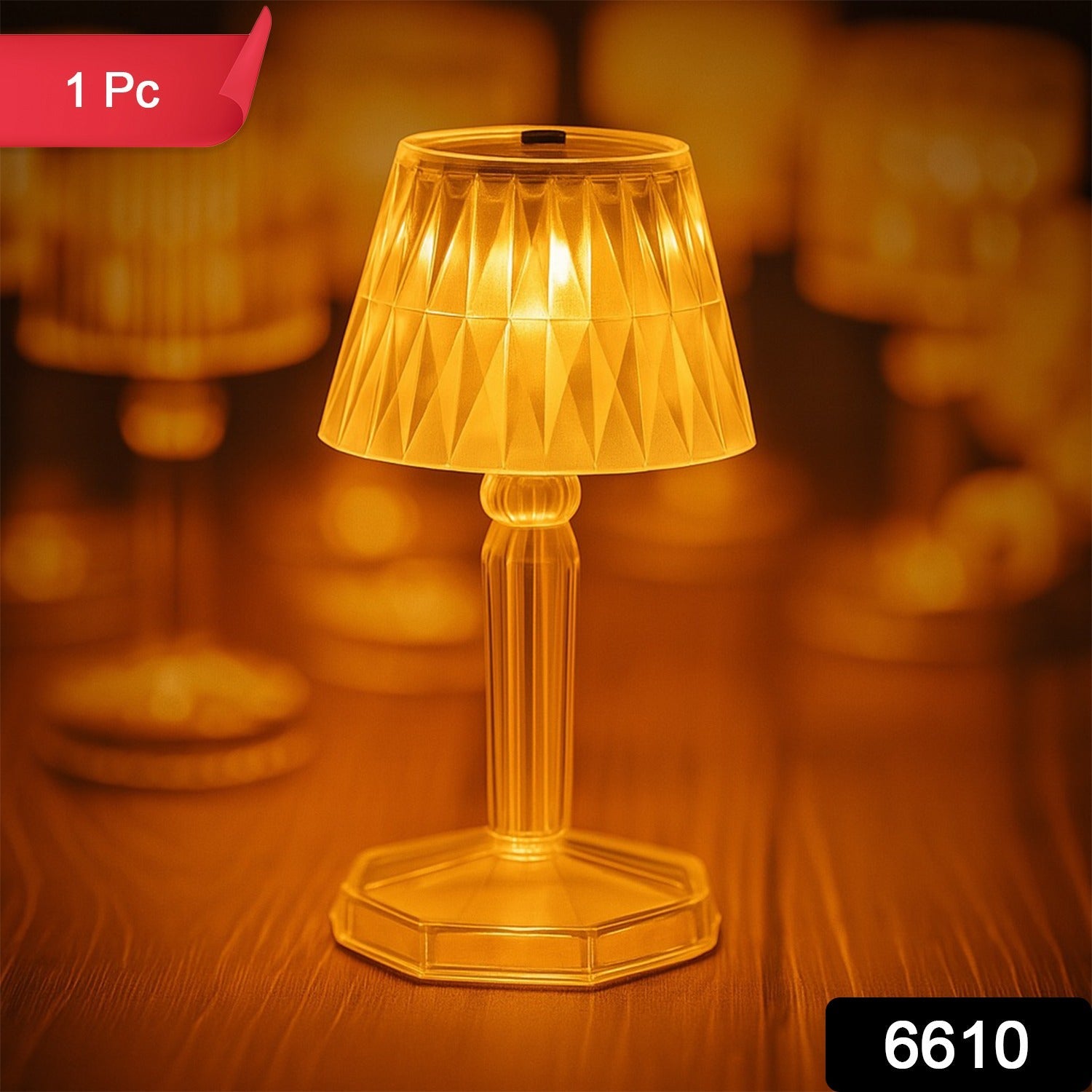 The mini crystal table lamp illuminating a modern living room setting.