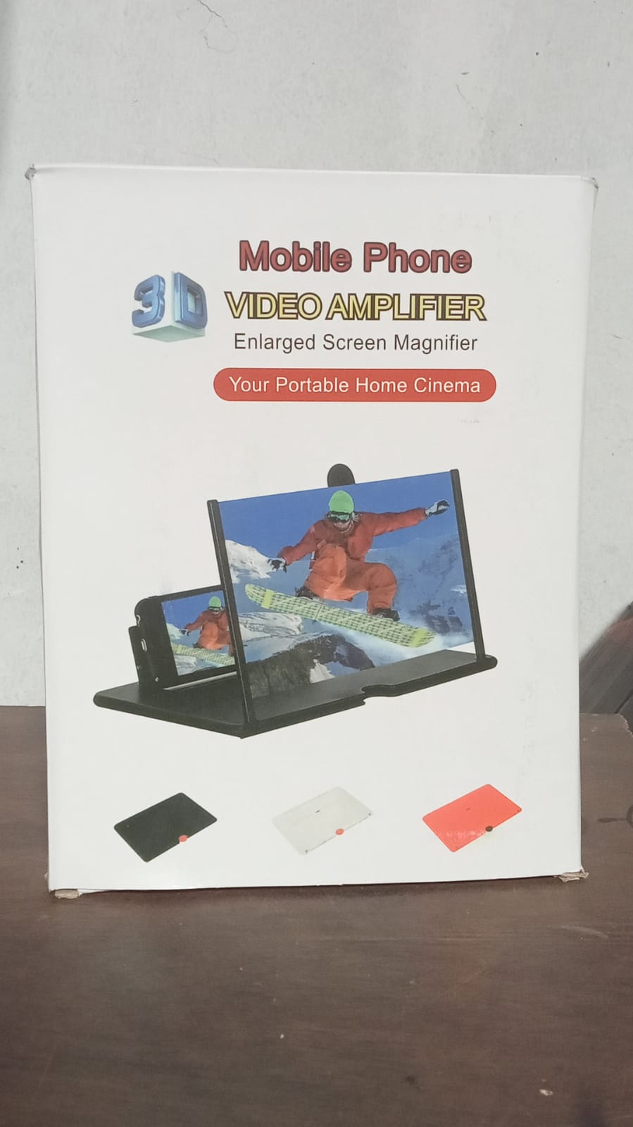 Adjustable mobile screen amplifier reducing eye strain while watching videos.