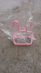 An empty plastic Shoe Drying Rack, highlighting its simple and effective hanging design.