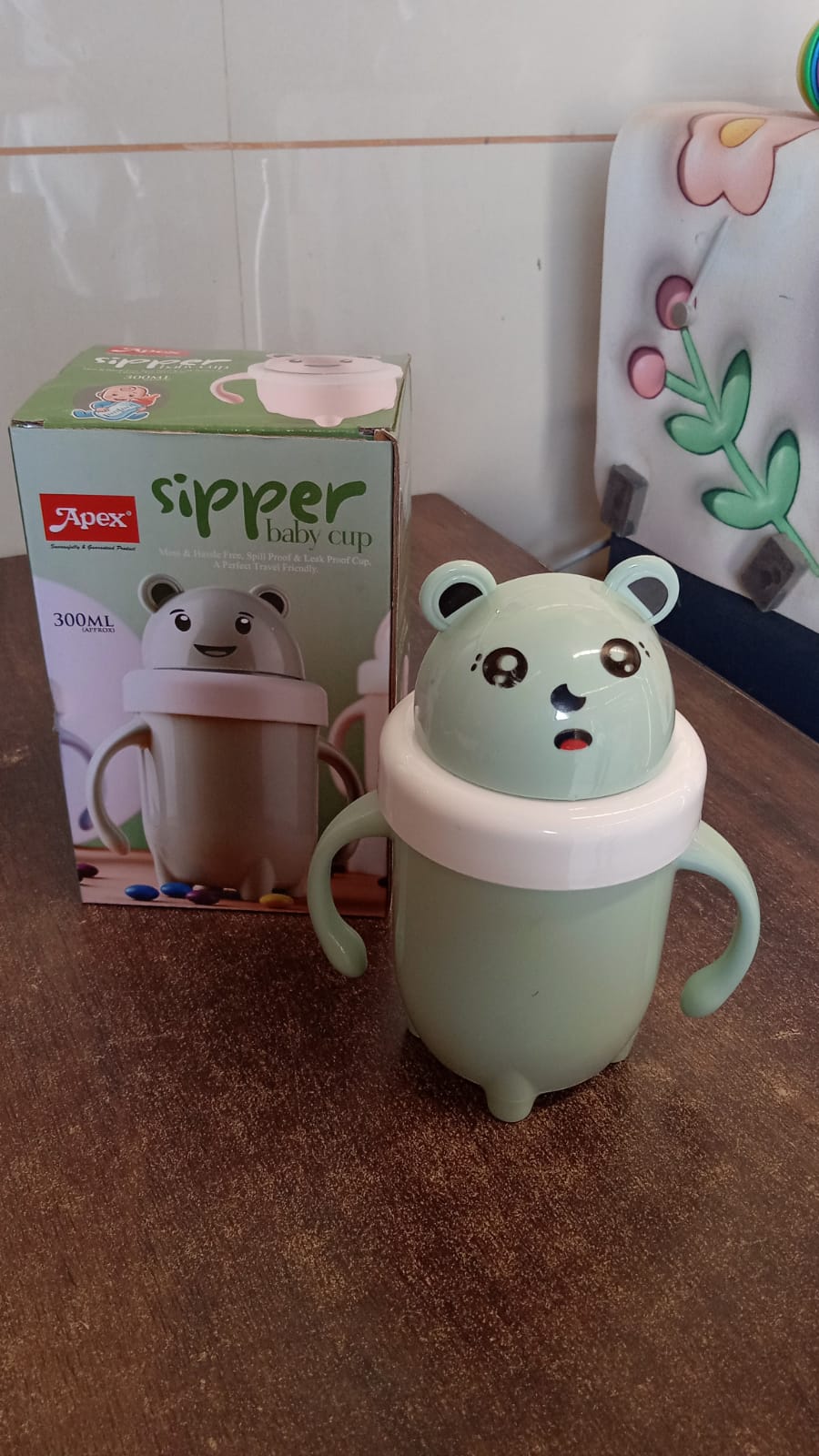 Travel-friendly sipper baby training cup with leak proof features