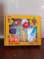 All seven pieces of the Aditi sliceable fruit cutting toy set neatly arranged.