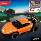 Close-up of metal RC supercar’s aerodynamic alloy body and wheels