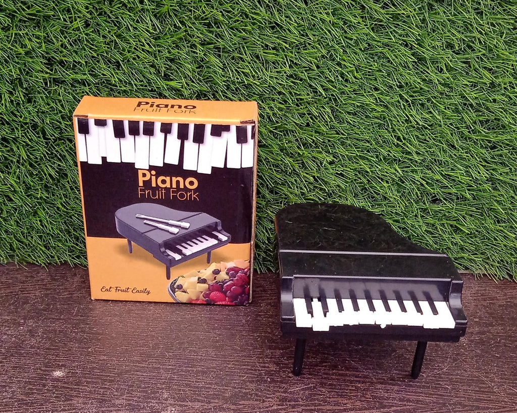 Isolated image of a single piano-themed fork, showcasing the detailed craftsmanship.