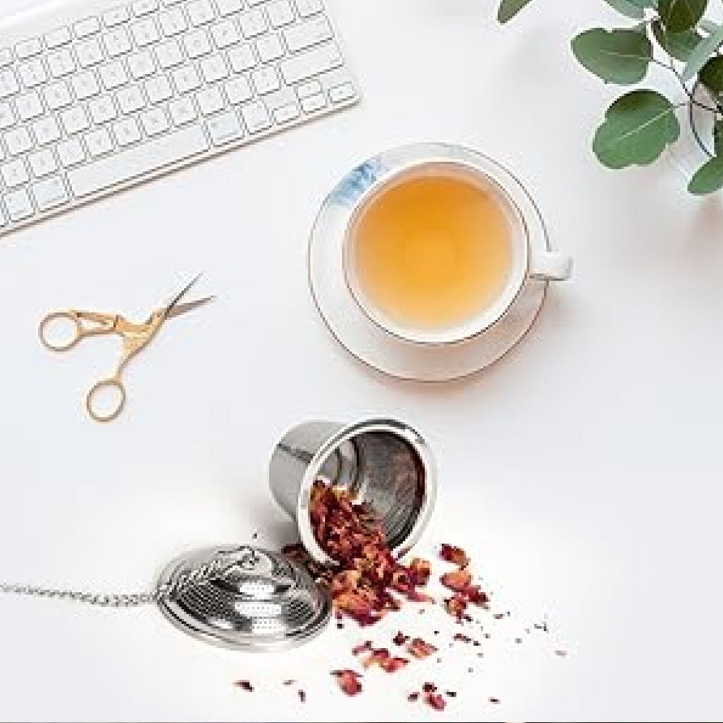 A versatile tea infuser ball made from high-quality stainless steel, ready for loose leaf tea.