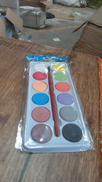 Close-up of a watercolor kit box, featuring product details and branding.