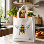 Bee print handbag filled with groceries in kitchen