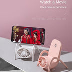 Portable Phone Holder Fan holding a smartphone, ideal for hands-free viewing.
