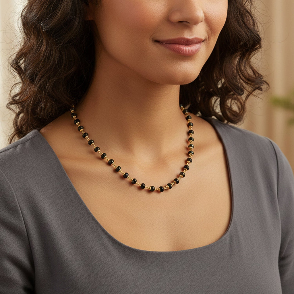 Long black beads mangalsutra necklace with golden details