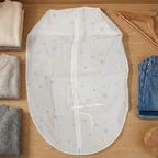 Non-woven garment cover shown protecting a blazer inside closet