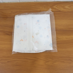 Non-woven garment cover hung inside wardrobe aiding closet organization