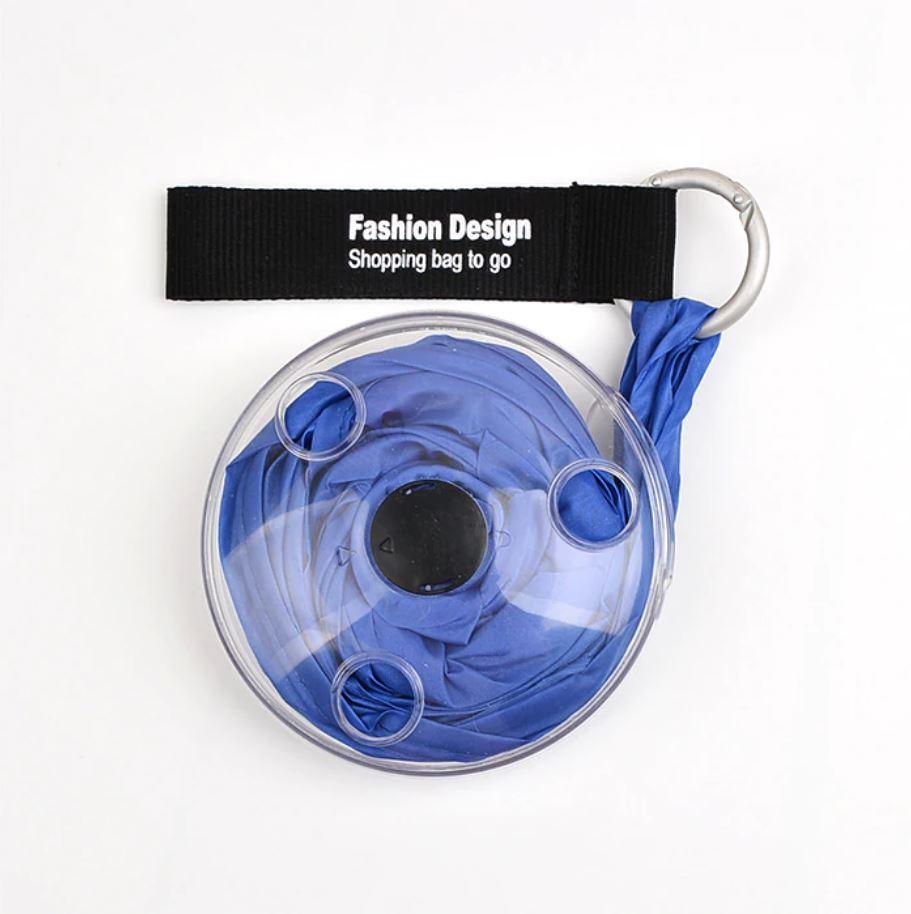 Vibrant blue insulated grocery bag displayed, highlighting its reusable design.