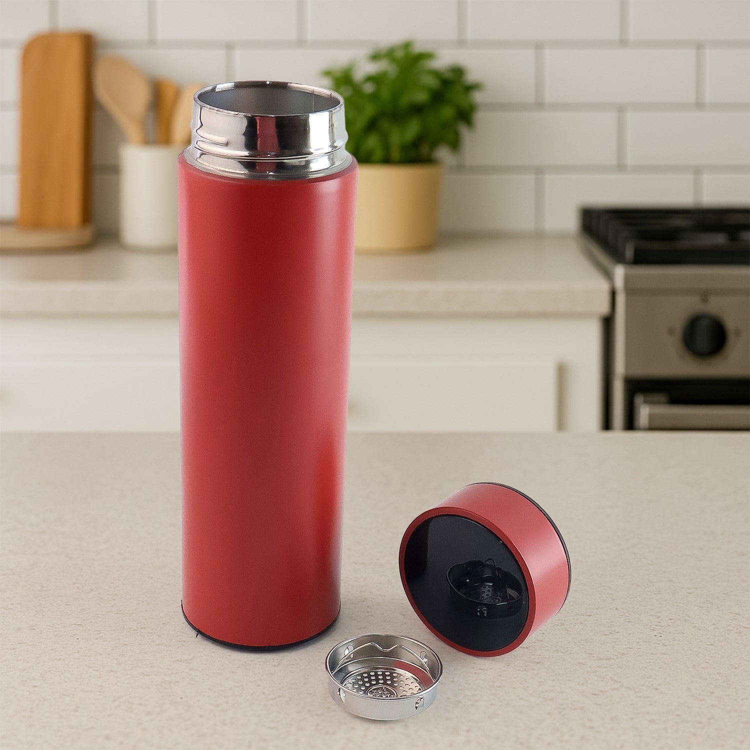 Close-up of red insulated water bottle highlighting the LED temperature screen.