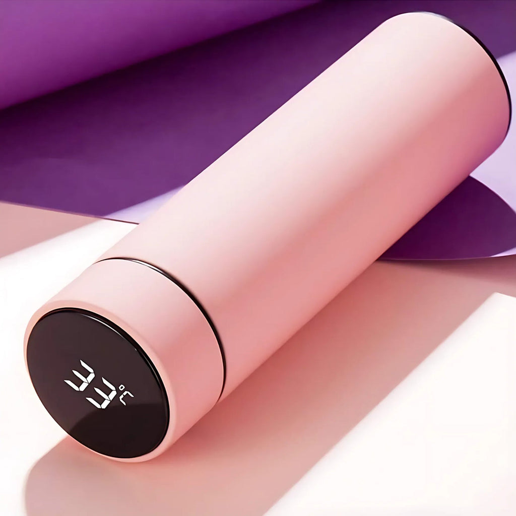 Pink insulated water bottle maintaining hot and cold temperatures
