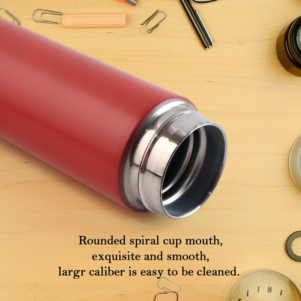 Red stainless steel vacuum insulated water bottle for hot and cold drinks.