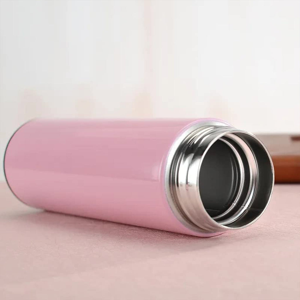 Compact pink water bottle for travel and fitness with temperature display