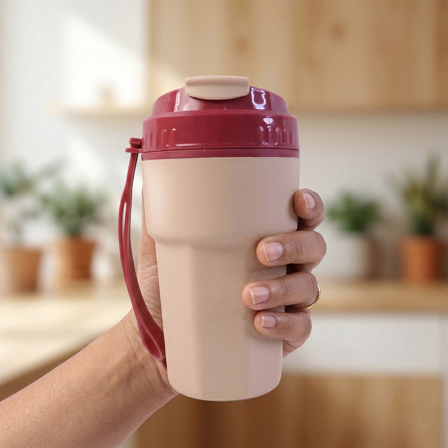 Plastic sipmate water bottle with carrying strap for easy transport