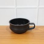 Large capacity deep handle bowl in actual use with food