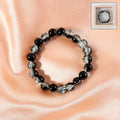 Dual-tone crystal beaded stretch bracelet with glossy transparent beads