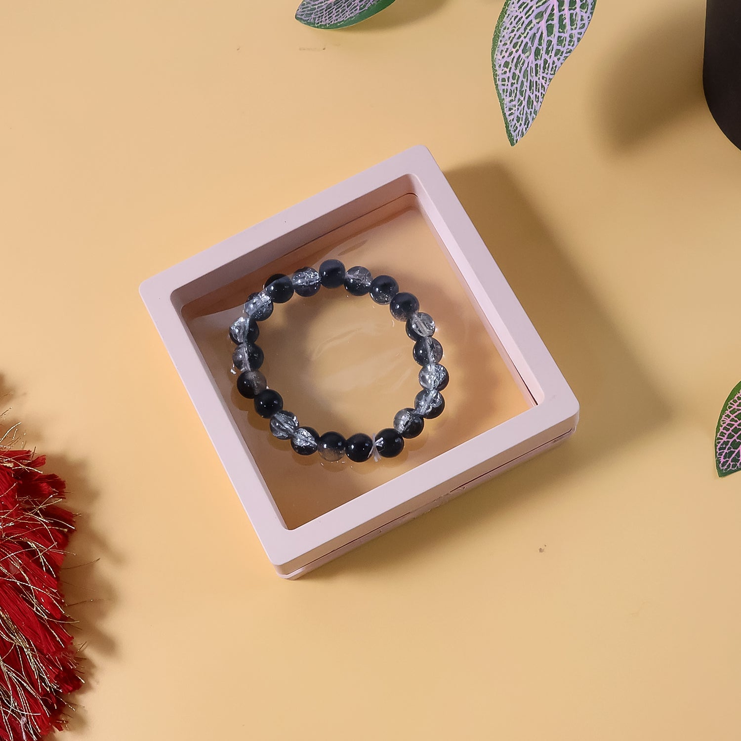 Elegant wrist bracelet featuring dual-tone crystal style beads