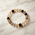 Close-up image of glossy crystal beads on the Dual-Tone Stretch Bracelet