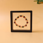 Multicolor elastic hand bracelet featuring glossy transparent beads