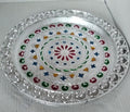 Elegant silver plated pooja thali, perfect for Indian traditional worship and ceremonies.