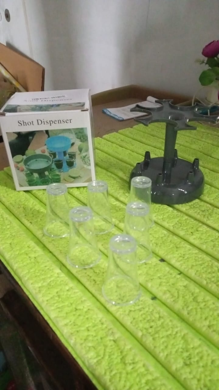 Another angle of the Siplix 6-shot dispenser, highlighting its compact and functional design.
