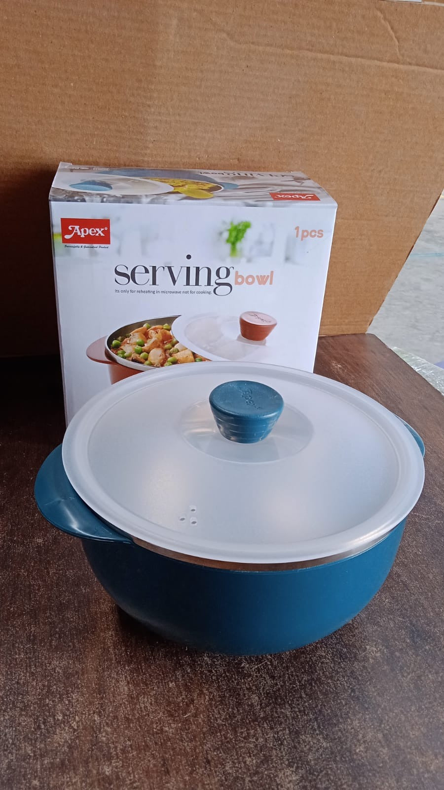 Side profile of microwave-safe plastic serving bowl with lid for kitchen use